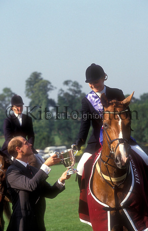 Tina Cassan on Genesis receive the Queen Elizabeth cup from Prince EdwardRoyal International Horse Show SJ130-02-09.JPG