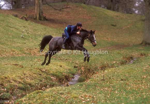 Lorna Clarke GBR riding Fearlith Mor at home jumping a small ditch PE01-02-08