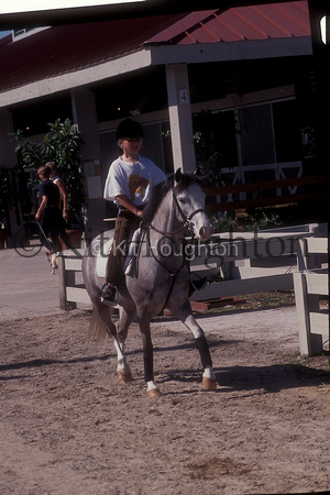 Young rider waming up pony SJ154-04-09