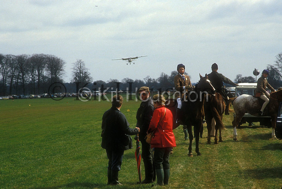 Airstrip with plane landing and Pony Club runnersEV141-20