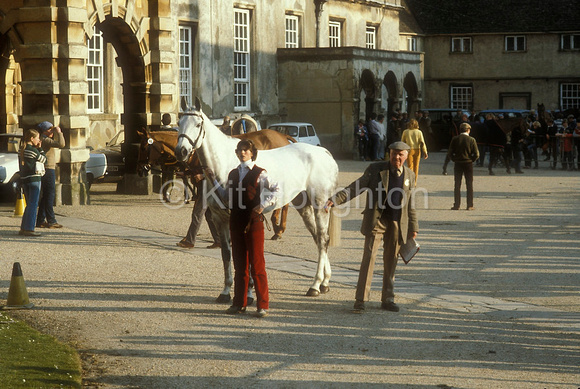 Diana Clapham and Windjammer wait their turn for the trot up with Dick James in the stable yard at BadmintonEV14-01