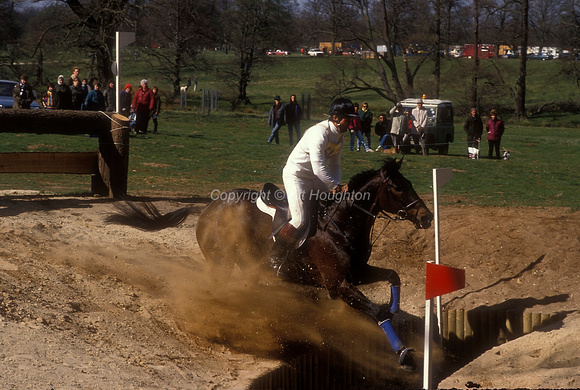 Captain Mark Phillips riding Cartier about to fall in coffin fence EV228-05-04