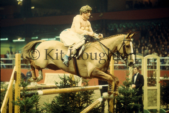 Ted Edgar competing in a fancy dress competition at the Horse of the Year Show, 1977 SJ01-04-10