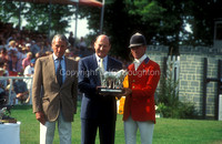 Bruce Davidson USA receives the winners trophy from P Beaumont, Duke of Beaufort EV340-13-13